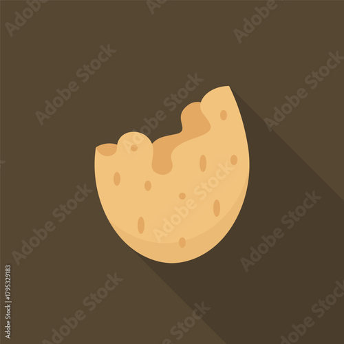 Broken almond shell with bite mark on dark background