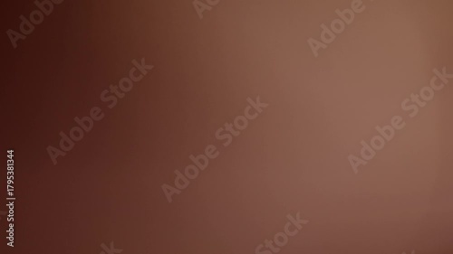 Captivating abstract background motion with soft, warm tones and subtle light shifts, perfect for modern intros