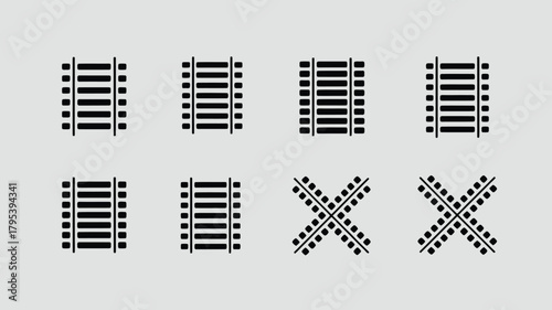 Bold black icons depicting various train track segments and crossings on a clean gray background, perfect for transport graphics
