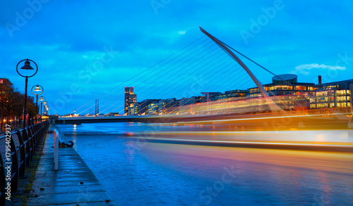 Photography Samuel Backett Bridge (Harp Bridge)   with motion speed light of passing ferry i