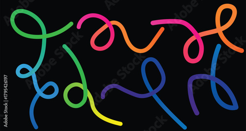 Vibrant neon glow sticks twisted into abstract shapes and letters against a black background