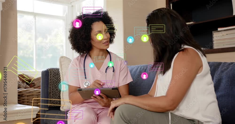 Nurse tapping tablet reviewing and initiating animated messages moving ...