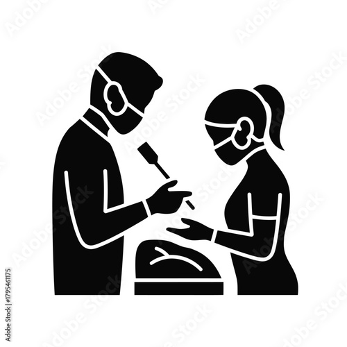 Medical professionals performing surgery together