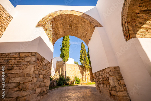 Arco do Repouso, a historic archway in Faro, Algarve, Portugal, showcasing traditional stone architecture