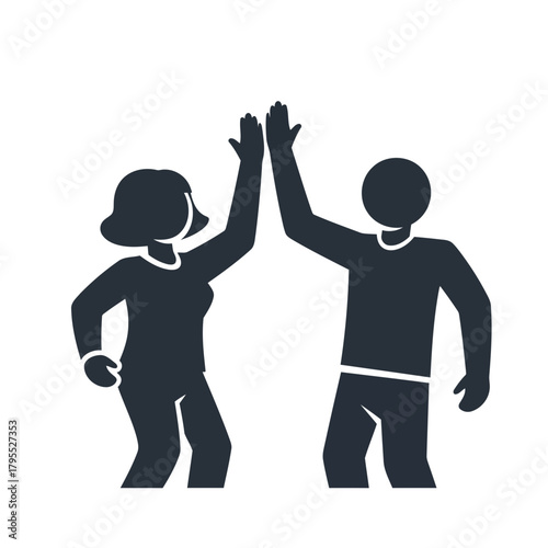 Two people giving each other a high five, symbolizing success, teamwork, and celebration
