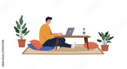 Man working on laptop at home