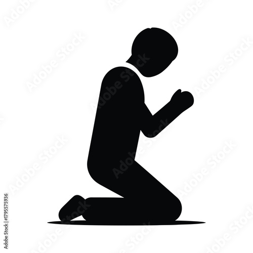 Silhouette of person kneeling with hands clasped in prayer or contemplation