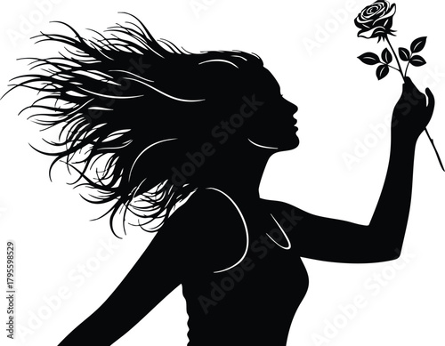 Graceful silhouette of a woman with windswept hair delicately holding a single rose in hand