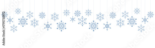 Minimalist winter graphic featuring seven stylized pale blue snowflakes hanging at various lengths by thin lines against a clean white background. Simple and elegant design for Christmas, New Year