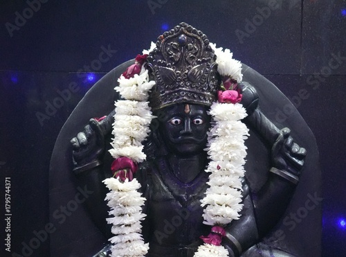 Shani Dev Stone Idol with Blue Decorative Lights