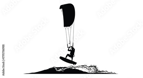 Kite surfer airborne over ocean waves kiteboarding