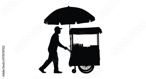 Man pushing cart under umbrella silhouette