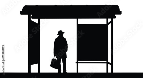 Man waiting at bus stop with bag shelter