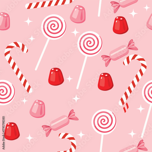 Seamless pattern with christmas candies, lollipops and candy canes on a pink background for textile and wrapping paper