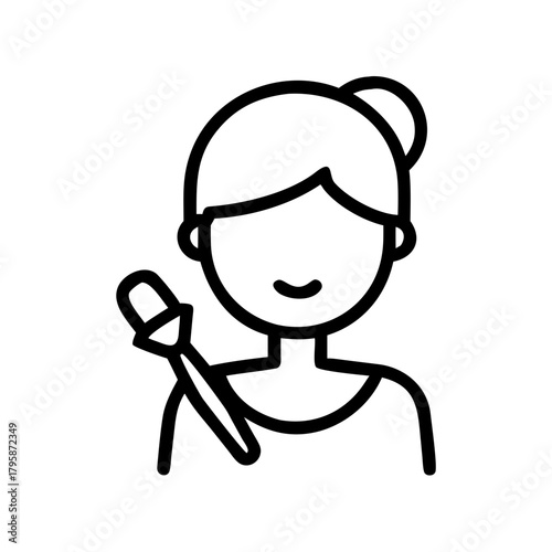 Makeup artist with a brush expressing creativity on copy space