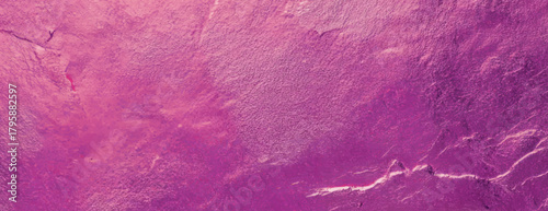 Pink textured background with a rough, stone-like appearance. The background is vibrant pink with a tactile, uneven surface. Textured stone background vector. Pink background.