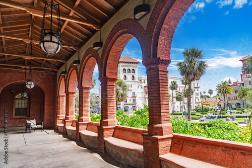 Spanish-style of Flagler College with palm trees and with arches