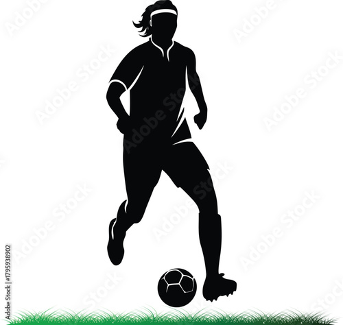 Silhouette of female soccer player dribbling the ball