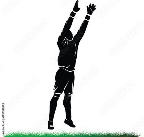 Soccer goalie jumping in the air to catch ball silhouette