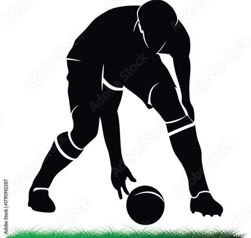 Black silhouette of basketball player dribbling ball in grass