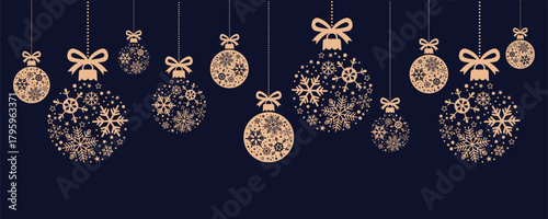 Elegant, festive holiday banner with a row of hanging light gold Christmas ornaments. Each is adorned with intricate snowflake and star patterns, suspended by bows on a dark navy blue background. Perf