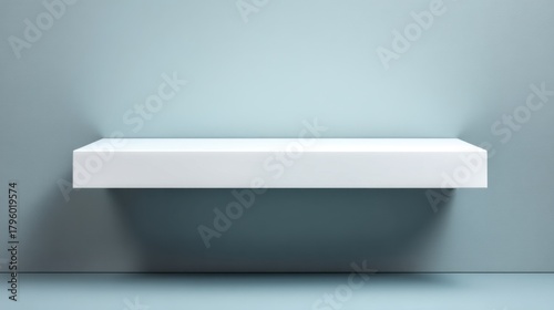 Wallpaper Mural Minimalist White Shelf Floating on Soft Blue Wall with Elegant Shadows and Modern Design for Contemporary Interior Display and Decoration Torontodigital.ca