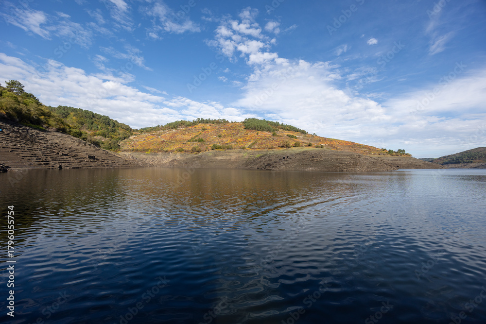 Naklejka premium Reservoir with low water levels during autumn drought