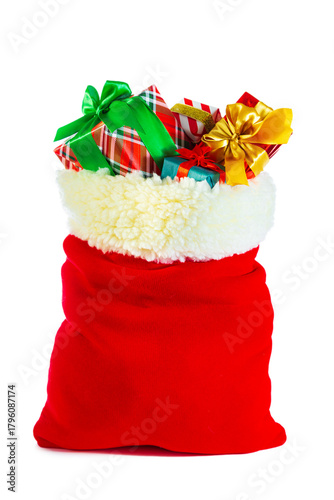 Santa's red sack full of gift boxes. Isolated on a white background.
