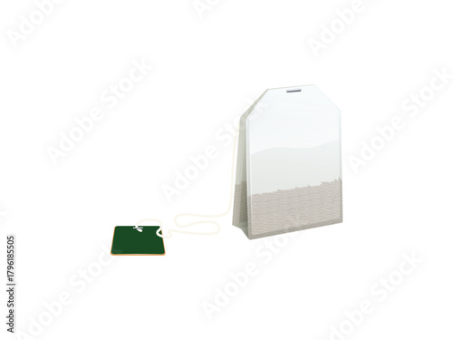 tea bag with white paper bag and green tag on white background in studio shot