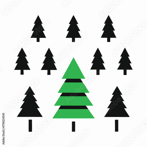 One green Christmas tree among black trees pine evergreen