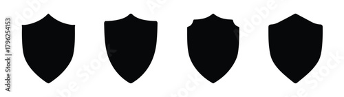Four black shield icons representing security protection defense and strength symbols