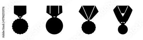 Collection of four distinct silhouette achievement medals with ribbons for awards