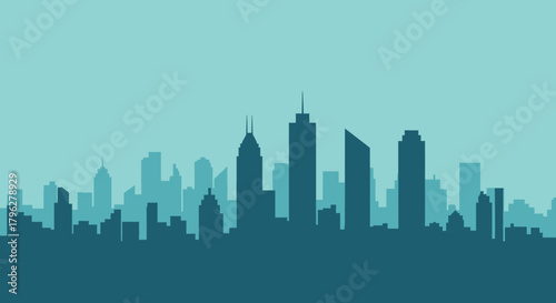 Silhouette of a modern city skyline with skyscrapers against a bright blue sky backdrop urban