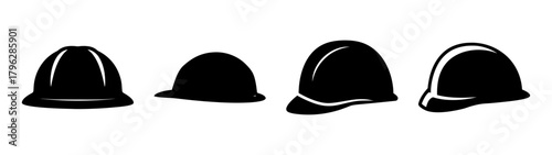 Collection of four black hard hats in various poses for construction and safety