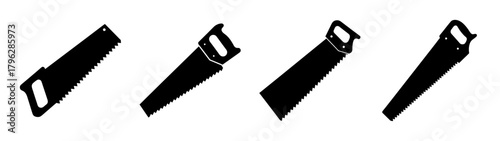 Four distinct hand saws in a row showcasing different blade and handle designs