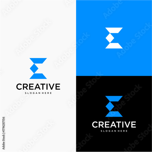 This logo features a bold, geometric abstract shape resembling an angular hourglass or two opposing triangles joined at their tips.