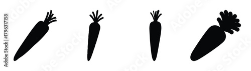 Four artistic black silhouette carrots variety of angles and sizes for design