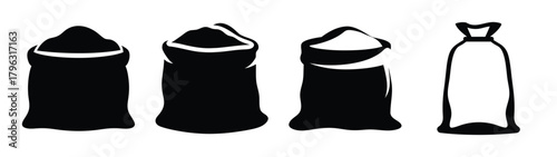 Four bags including filled burlap sacks and a plain drawstring bag isolated on white