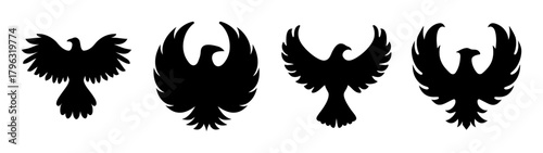 Collection of four black silhouette phoenix bird designs flying with wings spread