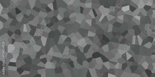 Monochromatic abstract mosaic background with irregular polygonal shapes in varying shades of gray creating a textured and geometric visual pattern