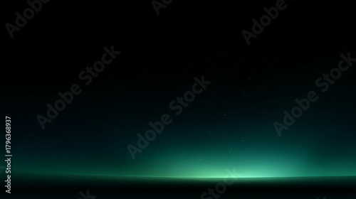 Dark horizon with subtle starry sky and glowing teal light black green
