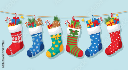 Festive Christmas stockings filled with gifts, candy, and treats, hanging on a string for holiday cheer