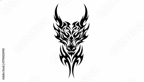 Intricate black tribal tattoo design featuring a stylized horned animal head with swirling patterns.