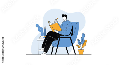 A person sitting in a blue chair and reading a book with a pencil in hand.