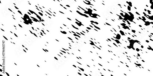 Abstract distressed surface with chaotic ink blotches and irregular worn patches.