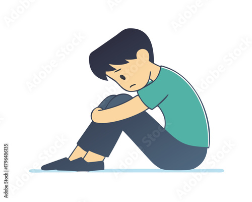 sad boy sitting alone