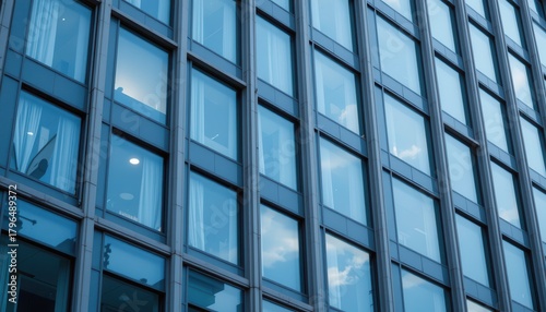 Wallpaper Mural Modern Glass Facade of an Urban Office Building with Reflections of Sky and Clouds on Windows Torontodigital.ca