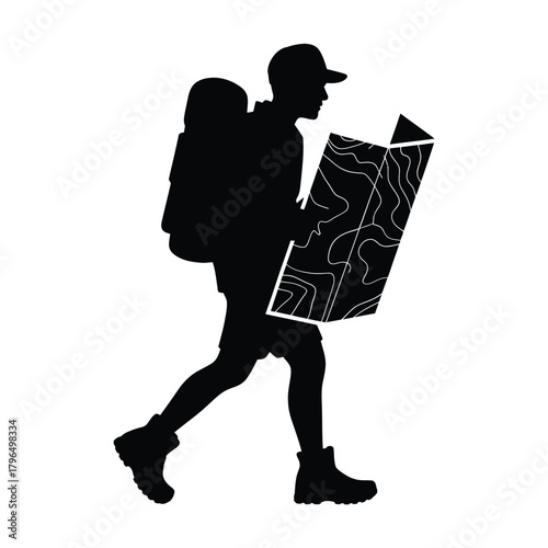 Silhouette of a hiker with a backpack consulting a map