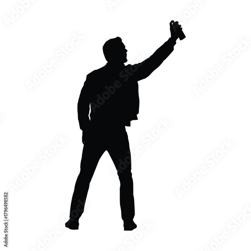 Silhouette of a Graffiti Artist or Man Spraying Paint, Representing Urban Art, Vandalism, or Protest