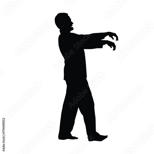 Silhouette of a Zombie, Sleepwalker, or Man Walking with Arms Outstretched, Horror or Exhaustion